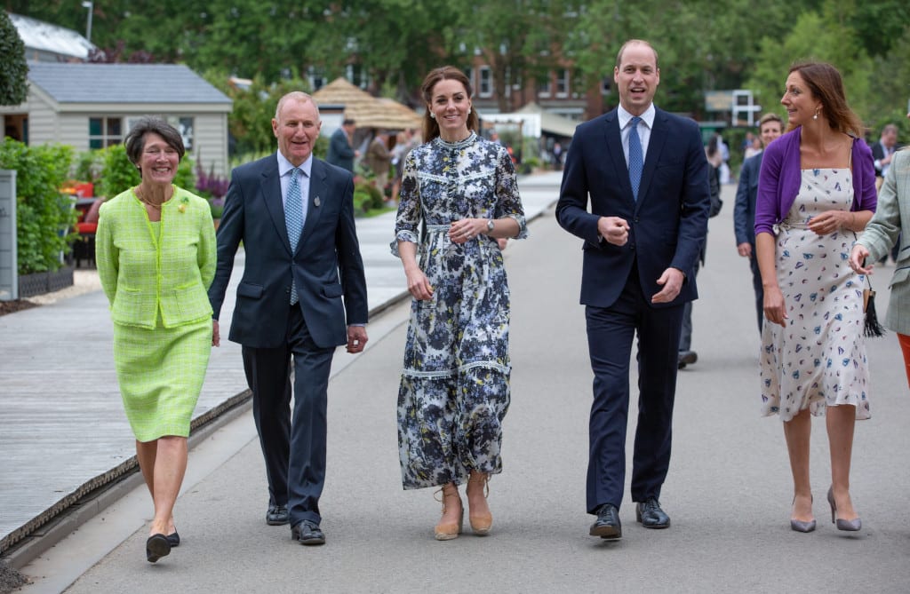 William and Catherine the Duke and Duchess of Cambridge walk with RHS Treasurer Sandy Muirhead and his wife left, and Haley Monckton at the RHS Chelsea Flower Show during press day in London, May 20, 2019. Photo by Suzanne Plunkett/RHS